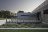 Modern home with Exterior. An ipe bridge provides entry to the home Photo 9 of North Fork Bluff House
