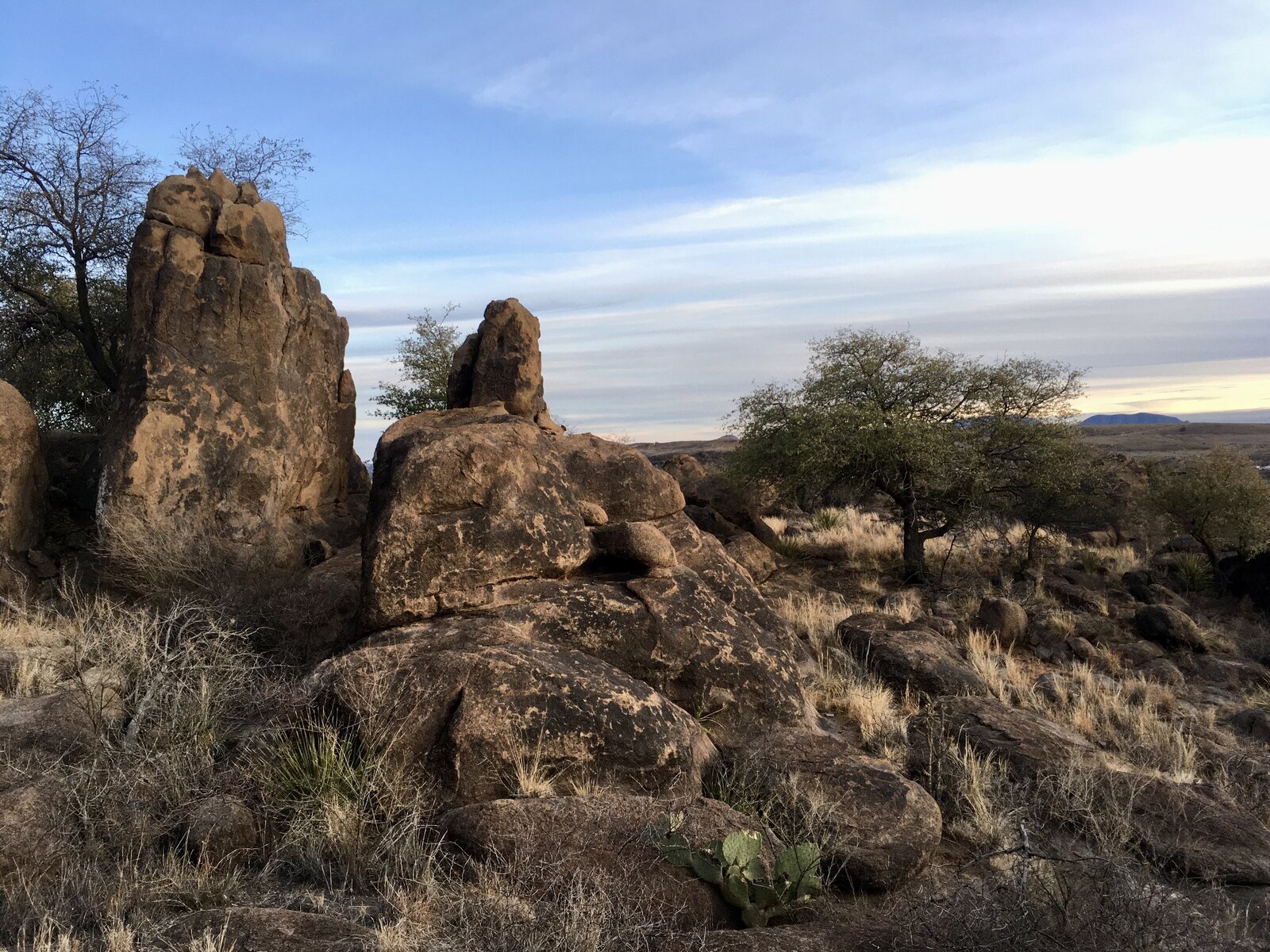 A view of the rocky high desert terrain on the home's property.