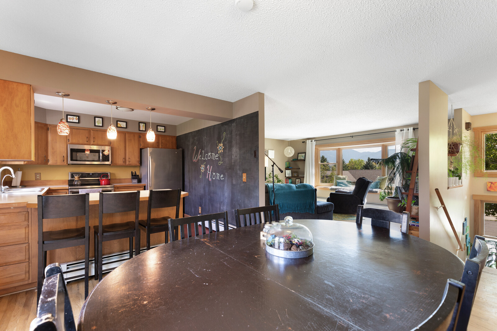 As purchased, the kitchen was mostly cut off from the living room.