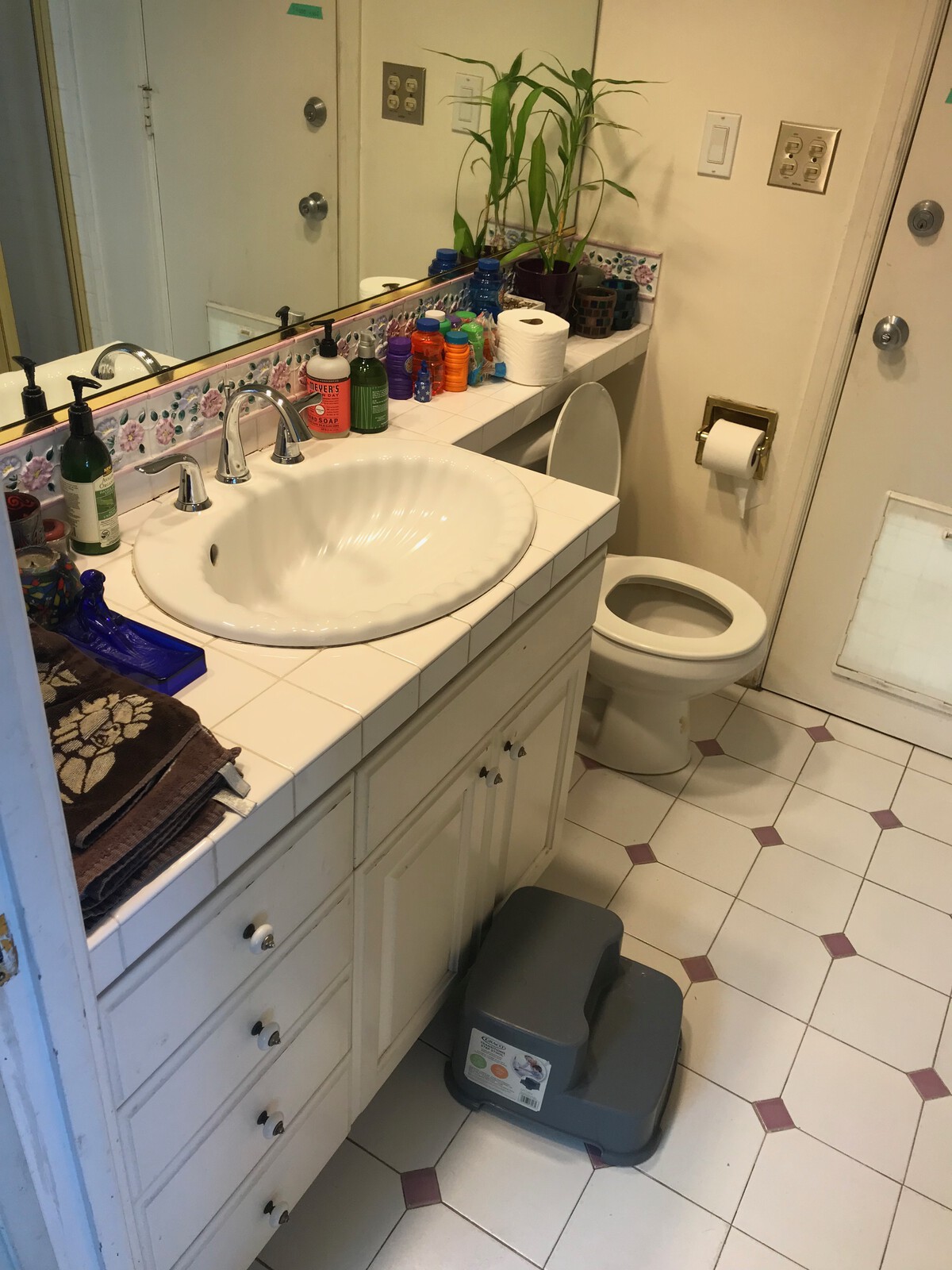 The exisiting main bathroom was small for a family of four, and its look needed updating.