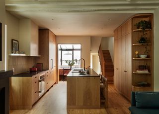 Before & After: Their Rebuilt Philly Town House Makes a Case for the Solarium—and a Bathroom Fridge