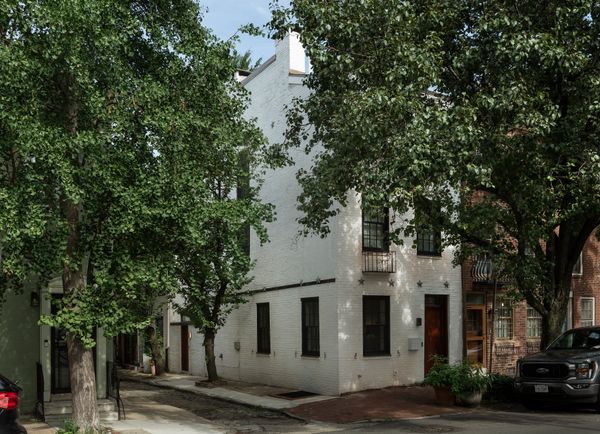 The eterior of the early-1800s brick townhouse.