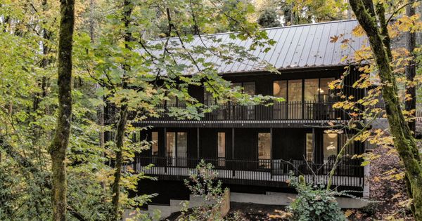 Every room in the home, be it the top-floor great room or the downstairs bedrooms, open onto outdoor patios.