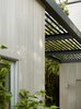 Modern home with Exterior, Wood Siding Material, Metal Roof Material, House Building Type, and Shed Building Type. Potrero Residence Trellis Detail Photo 14 of Potrero House