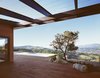 Modern home with Outdoor, Metal Fences, Wall, Large Pools, Tubs, Shower, Horizontal Fences, Wall, Boulders, Trees, Hardscapes, Swimming Pools, Tubs, Shower, Grass, Shrubs, Concrete Pools, Tubs, Shower, Large Patio, Porch, Deck, Metal Patio, Porch, Deck, Landscape Lighting, Wire Fences, Wall, Back Yard, Decking Patio, Porch, Deck, and Wood Patio, Porch, Deck. Ridge House Photo 3 of Ridge House
