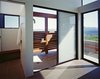 Modern home with Bath Room, Ceramic Tile Wall, Porcelain Tile Floor, Enclosed Shower, Ceiling Lighting, Concrete Floor, Open Shower, and Wall Lighting. Ridge House Photo 9 of Ridge House