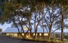 Modern home with Exterior, Gable RoofLine, Metal Roof Material, House Building Type, and Wood Siding Material. Orchard House Front Photo of Orchard House