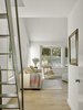 Modern home with Bedroom, Recessed Lighting, Wall Lighting, Medium Hardwood Floor, Table Lighting, and Chair. Orchard House Interior Photo 9 of Orchard House