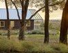 Modern home with Exterior, House Building Type, Gable RoofLine, Farmhouse Building Type, Metal Roof Material, and Wood Siding Material. Orchard House Exterior Photo 11 of Orchard House