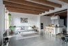 Modern home with White Cabinet, Chair, Concrete Floor, Porcelain Tile Floor, Wood Counter, Living Room, Sofa, and Coffee Tables. Living Room Photo of Old Town Refurbishment