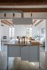Modern home with Kitchen, Ceramic Tile Floor, Wood Counter, and White Cabinet. Kitchen Table Photo 4 of Old Town Refurbishment