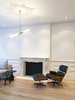 Modern home with Living Room, Chair, Light Hardwood Floor, and Ceiling Lighting. Parlor Photo 2 of Two-Way House