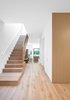 Modern home with Staircase, Wood Tread, and Wood Railing. Main Stair Photo 6 of Two-Way House