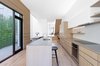 Modern home with Kitchen, Ceiling Lighting, Light Hardwood Floor, Drop In Sink, and Wood Cabinet. Kitchen Dining Photo 11 of Two-Way House