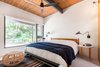 Modern home with Bedroom, Bed, Night Stands, Wall Lighting, Rug Floor, and Carpet Floor. The revamp also comprised of reworking the layout of the master suite. However, the windows and original wood ceilings were maintained for warmth and light.
Photo 10 of Hillside Midcentury