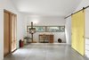 Modern home with Shed & Studio, Living Room Room Type, Living Space Room Type, and Family Room Room Type. The 760sf flex space is large enough for guests and creative endeavors. Photo 4 of Stable Conversion