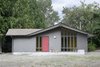 Modern home with Exterior, Tiny Home Building Type, Shingles Roof Material, Wood Siding Material, and Gable RoofLine. What was once a working stable, transformed into a modern refuge for work and play. Photo 7 of Stable Conversion