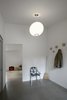 Modern home with Hallway and Concrete Floor. A dedicated entry space with a large closet provides storage to keep the small space clean and organized. Photo 8 of Stable Conversion