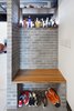 Modern home with Storage Room and Shelves Storage Type. The kitchen counter was extended beyond the original range to create a protected entry way as storage was an outstanding issue in the loft space. Photo 5 of Capitol Hill Loft