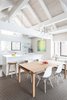 Modern home with Table, Night Stands, Bed, End Tables, Sofa, Coffee Tables, Bar, Wood Tread, Wood Railing, Metal Railing, Cable Railing, Pendant Lighting, Porcelain Tile Wall, Kitchen, Engineered Quartz Counter, and Carpet Floor. Kitchen Photo 13 of Tahoe Lakefront