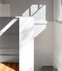 Modern home with Marble Counter, Light Hardwood Floor, Colorful Cabinet, Ceramic Tile Backsplashe, and Staircase. Stairs Photo 6 of Land Park Drive