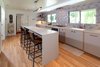 Modern home with Kitchen and Light Hardwood Floor. Kitchen Photo of Birchwood