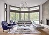 Modern home with Living Room, Wood Burning Fireplace, Light Hardwood Floor, Sofa, Bench, Pendant Lighting, Chair, and Coffee Tables. Living Room Photo 3 of Riverwoods