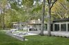 Modern home with Exterior, House Building Type, and Flat RoofLine. Back Yard & Patio Photo 2 of Riverwoods