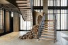 Modern home with Staircase, Wood Tread, and Metal Railing. The lobby and all of 1 Hotel Brooklyn Bridge’s interiors were designed by INC Architecture & Design in partnership with Starwood Capital Group. And for however beautiful the lobby is, the rooms are the place you don’t want to leave. In the case of our visit—a family of four spending three nights at the hotel—that’s saying something since we stayed in the Skyline 2 Beds room, which offers two double beds. After the first night, we wished we’d been able to upgrade to a suite: Two people in a double bed does not make for the best sleep, even if it’s on a hemp-blend mattress wrapped in organic cotton sheets. But we consoled ourselves by opening our massive sliding door, nestling into the built-in seating area that’s covered in nubby textiles and gazing out at the view of the Statue of Liberty. "Every room has a floor-to-ceiling sliding window that opens to that landscape and makes you feel like you’re on a balcony," Marvel says. Photo 6 of 1 Hotel Brooklyn Bridge