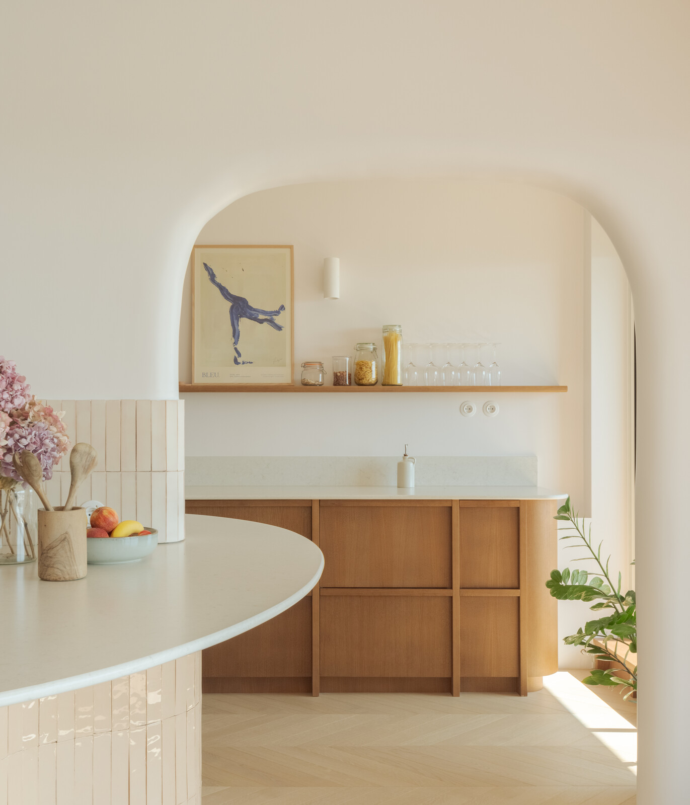 Natural light provides the kitchen with an ethereal quality.