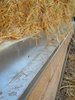 Rice straw bale, sourced from a local farmer, were placed on top of the Watershed Block walls, sequestering carbon while insulating the home. Photo 20 of Healdsburg Family House modern home