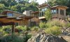 The homestead is designed as a series of east-west running volumes, roughly paralleling the topography and stepping up the hill. Boulders discovered during excavation were located throughout the gardens. Photo 13 of Healdsburg Family House modern home