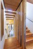 Douglas Fir planks and flooring were harvesting on-site and used throughout the stairwell and upper levels. Photo 10 of Healdsburg Family House modern home