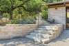 Watershed Block earth masonry retaining walls limited the number of concrete deliveries at the remote location, and provided a warm, variegated texture. Photo 6 of Healdsburg Family House modern home