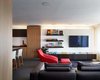 Designed for an itinerant and successful young entrepreneur, the residence accommodates all functions of living, whether they take place over a single day or many months.
#smallspace #storage #livingroom #kansascity #hufft
Photo credit by Mike Sinclair Photo 5 of Pied-à-Terre modern home
