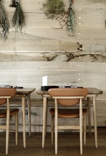 The restaurant’s furniture was created by Malte Gormsen using traditional Danish craftsmanship and carpentry. The 108 Chairs are by Finn Juhl. 