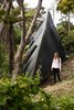 Modern home with Outdoor, Trees, Back Yard, and Shrubs. Set in the New Zealand rain forest, the Tate has landscaped the site with hundreds of plants exclusive to New Zealand to recreate a natural native forest landscape. Photo 7 of The Tent House
