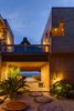 Modern home with Outdoor, Landscape Lighting, Walkways, Shrubs, and Side Yard. The home features a stunning view of a private beach. Photo 3 of Casa en el Pacifico