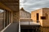 Modern home with Outdoor, Concrete Patio, Porch, Deck, Small Patio, Porch, Deck, Side Yard, and Wood Fences, Wall. The natural materials areputting a contemporary spin on tradition. Photo 10 of Casa en el Pacifico
