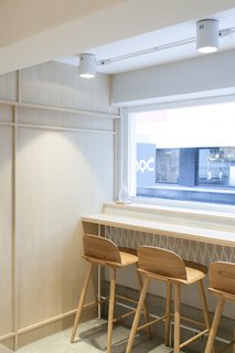Bar seating by the window makes for excellent people watching. 