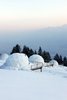 Modern home with Exterior, Dome RoofLine, Prefab Building Type, Cabin Building Type, Glass Siding Material, and Tent Building Type. The geodesic domes look like igloos in the snowy Alpine landscape. Photo 11 of Whitepod Eco-Luxury Hotel