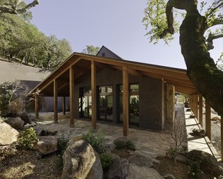 A wrap-around porch shelters visitors from the hot summer sun and protects from the winter rains that are characteristic of Napa Valley.