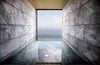 Modern home with Bath Room and Soaking Tub. The wellness area is divided into two areas: a wet zone with a stone swimming pool, sauna, and a Turkish bath; and a separate zone for spa treatments. Photo 7 of Hotel Akelarre