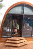 Modern home with Outdoor, Wood Patio, Porch, Deck, and Small Patio, Porch, Deck. The tents blend seamlessly into the surrounding landscape, thanks to a carefully selected material palette. The arched fabric structures even take on the shape and color of the surrounding rocks and boulders. Photo 4 of Wild Coast Tented Lodge