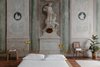 Modern home with Bedroom, Table Lighting, Bed, Chair, Lamps, Night Stands, and Rug Floor. Apartment #4 has a strong sense of place with all the original frescos left intact. Photo 8 of Numeroventi