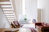 Modern home with Staircase, Wood Tread, and Metal Railing. Lofted mezzanine floors and bathrooms were added to the apartments. Room #1 is particulary bright and airy. Photo 2 of Numeroventi