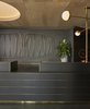Modern home with Living Room, Table Lighting, and Accent Lighting. The guest rooms and public areas feature a mix of influences that range from the New Bauhaus school of design and the work of brutalist Belgian architect Juliaan Lampens, to the bold geometric patterns of Josef and Anni Albers. Photo 4 of Ace Hotel Chicago