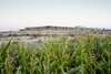 Modern home with Outdoor, Shrubs, and Field. The creation of the hotel was influenced by the site and unfolds as a succession of protected and comfortable interior spaces from which visitors can contemplate the exterior landscape. Photo 2 of Hotel Aire de Bardenas