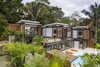 Modern home with Exterior, Beach House Building Type, Wood Siding Material, Flat RoofLine, and Metal Siding Material. Casa Meleku. Photo 3 of Joya Villas
