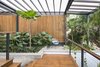Modern home with Outdoor, Trees, Horizontal Fences, Wall, Walkways, Wood Fences, Wall, Garden, and Gardens. A peaceful corner of Casa Meleku. Photo 19 of Joya Villas